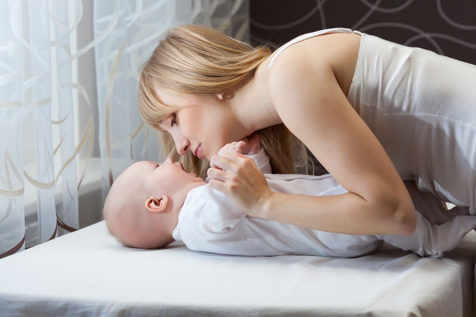 Mother with newborn sun